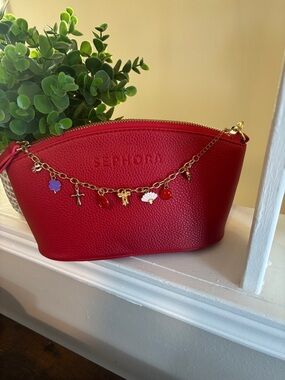 Chic Red Pebbled Leather Cosmetic Pouch with Gold Charm Chain ❤️✨ | Sephora